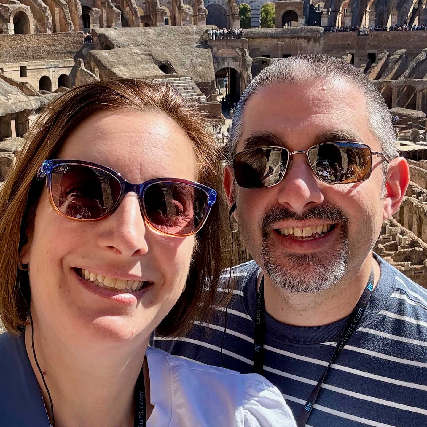 A photo of Evan Baum and his wife Beth Baum at the Colosseum in Rome.
