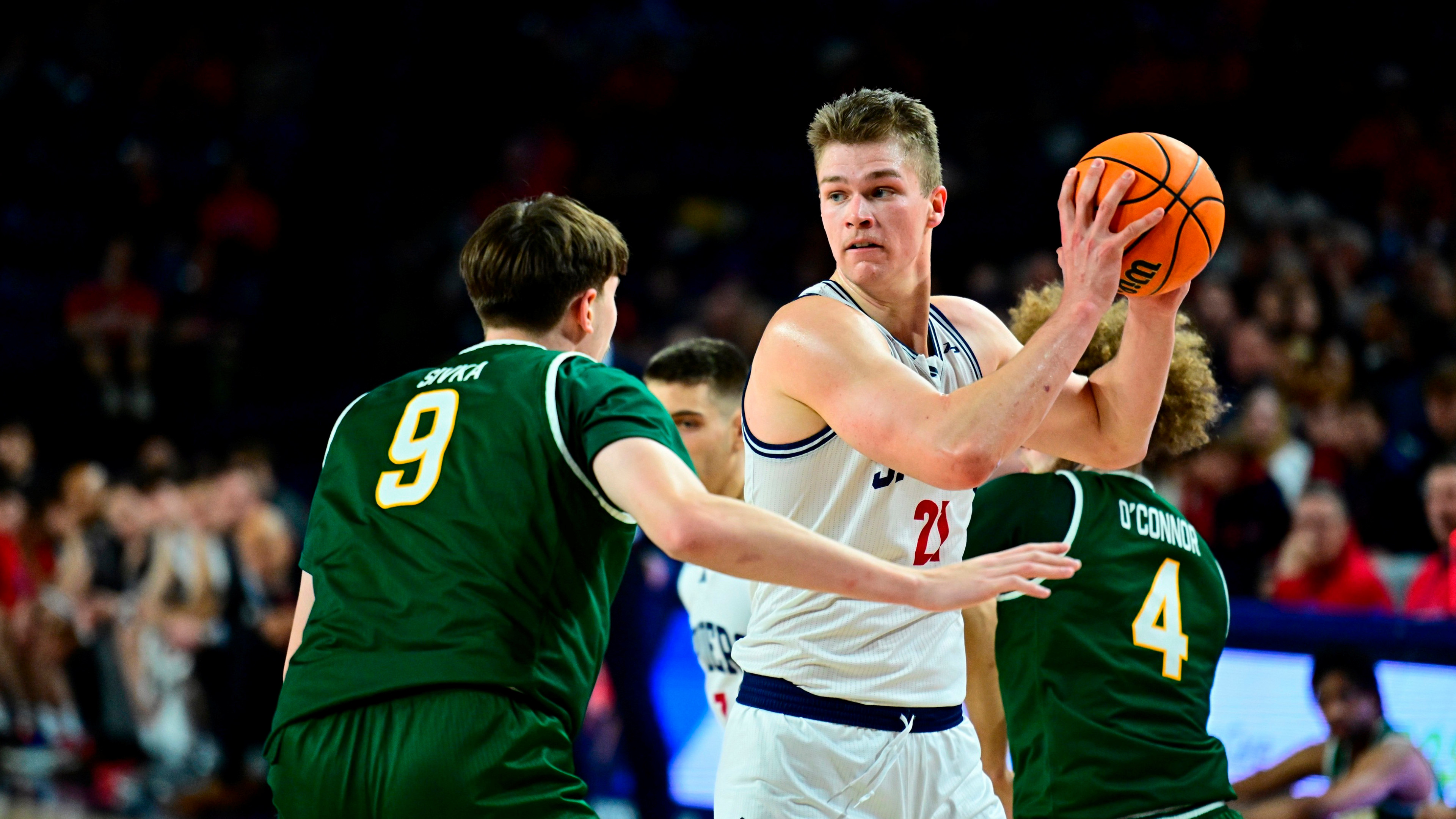 A photo of Michael Walz playing with the University of Richmond Spider men's basketball team.