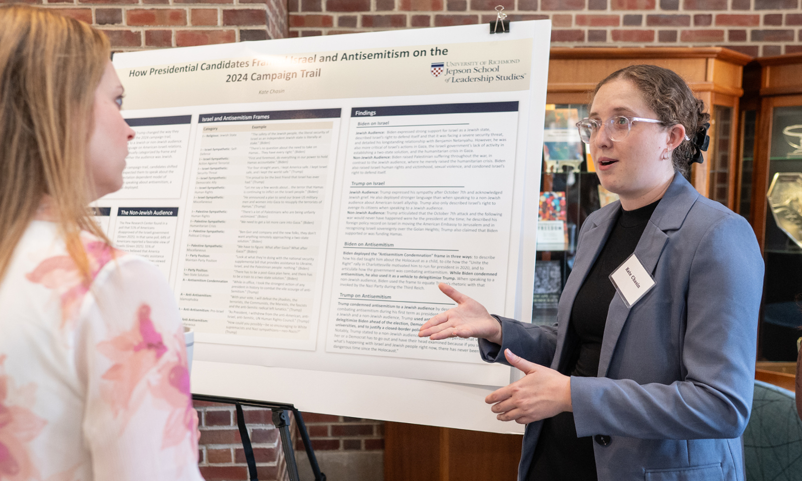 Kate Chasin presenting her research at a student symposium.