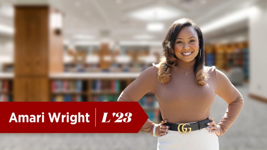 Amari Wright stands in the Muse Library