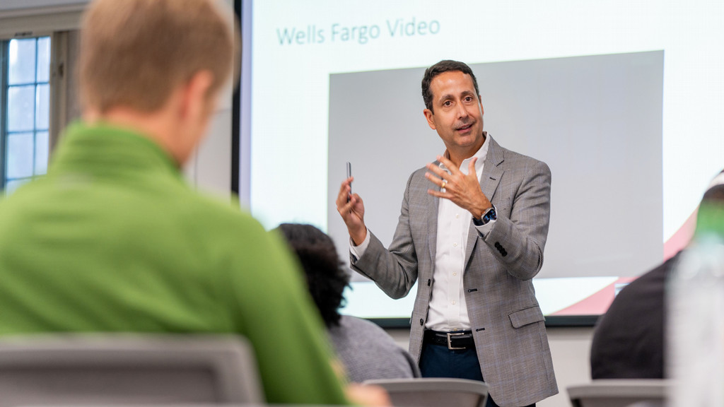 Professor Mickey Quiñones teaching at University of Richmond