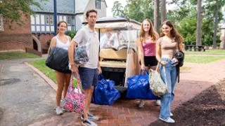 Family gathered outside dorm