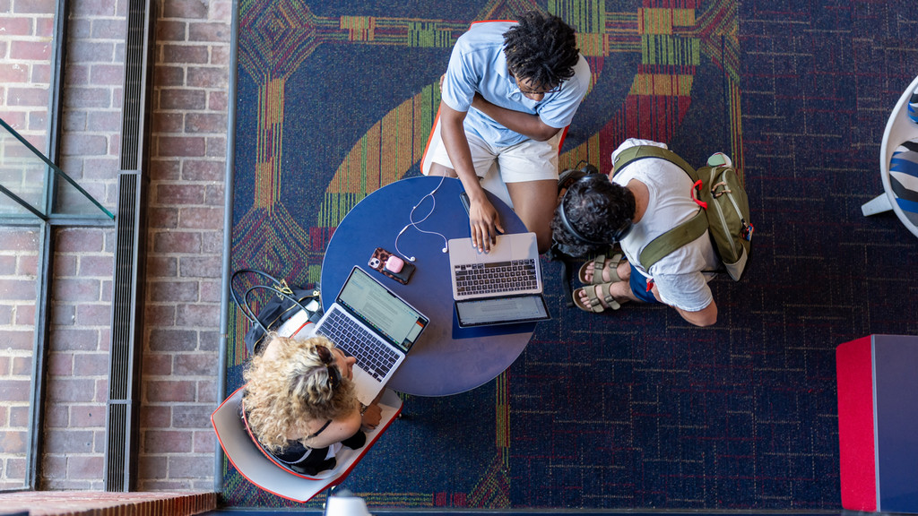 students working on computer