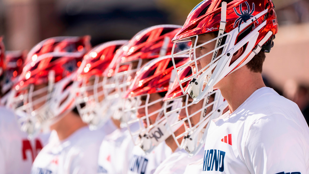 Men's lacrosse team standing in a row