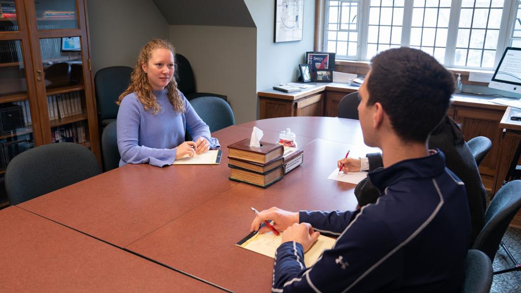 Student meeting with consultant at the Speech Center