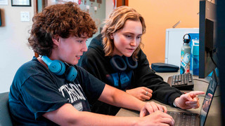 Students working at computer