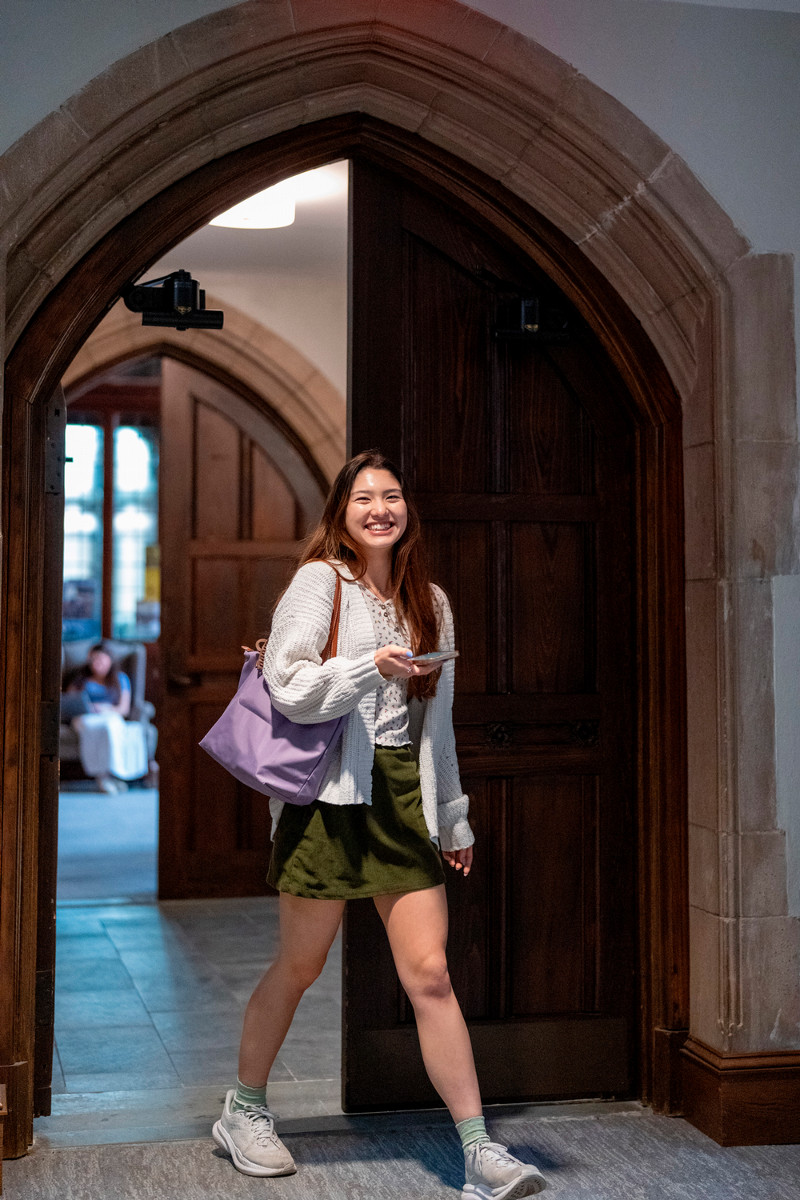 University of Richmond student walking through the Humanities Building