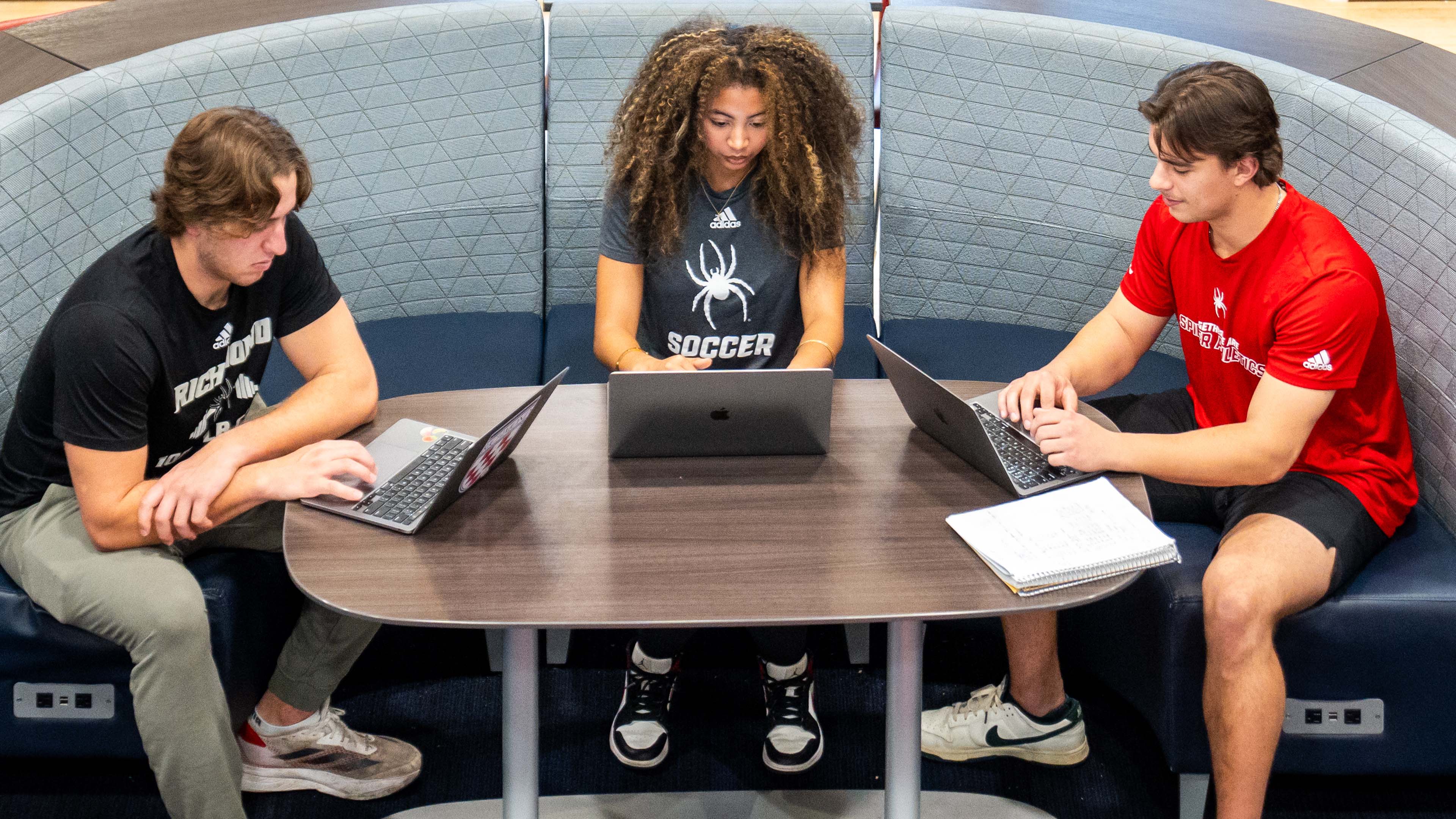 Student athletes studying together