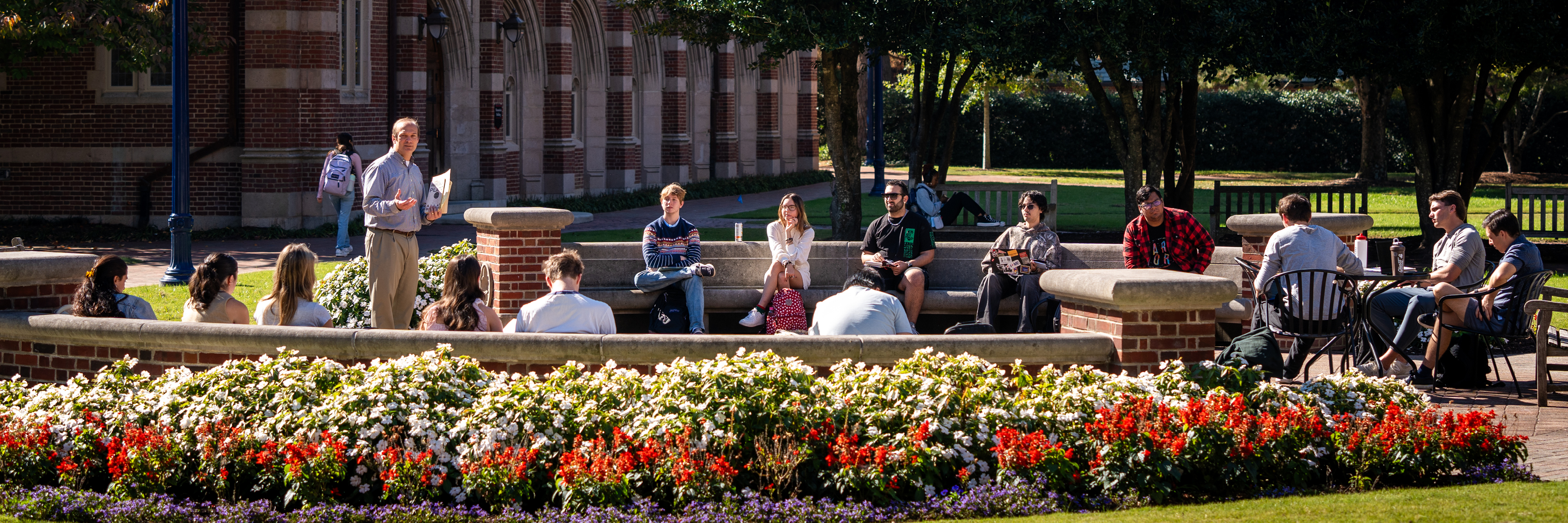 A photo of an outdoor class held in Stern Quad at the University of Richmond