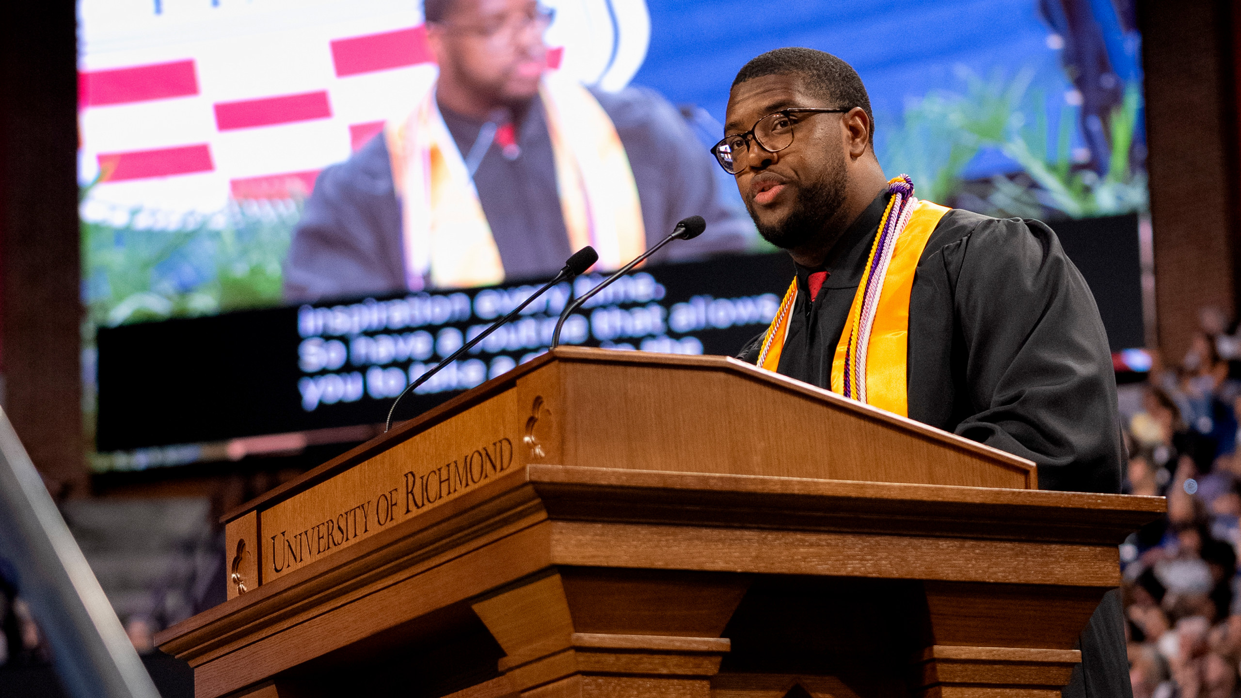 Kobie Turner, 2021 UR grad and defensive end for the Los Angeles Rams speaking at University of Richmond Commencement 2026.