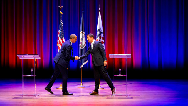 Jay Jones and Jason Miyares shake hands on stage before the 2025 Virginia Attorney General Debate.