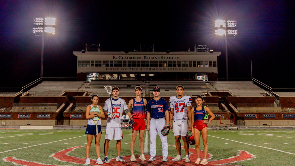 University of Richmond student-athletes in front of E. Claiborne Robins Stadium