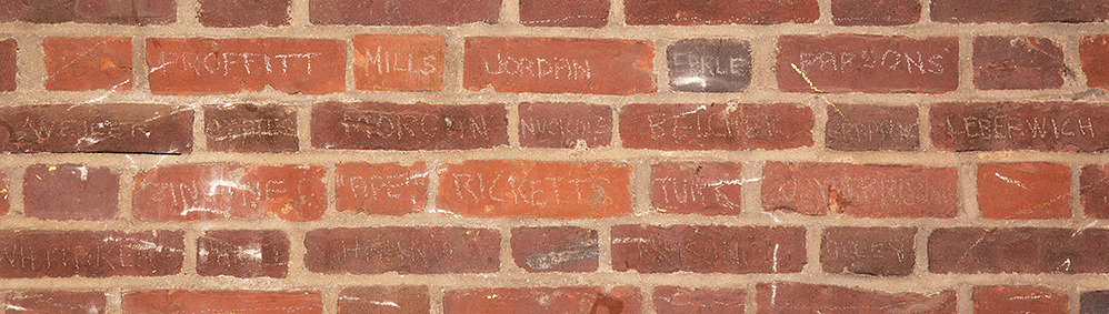 Alumni names in Millhiser gym bricks
